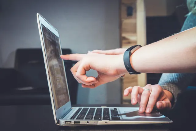 Customer chatting with support on a laptop