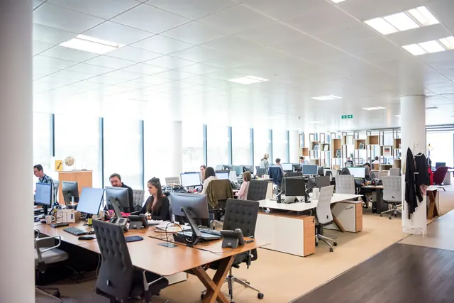 Open space office with a customer service team